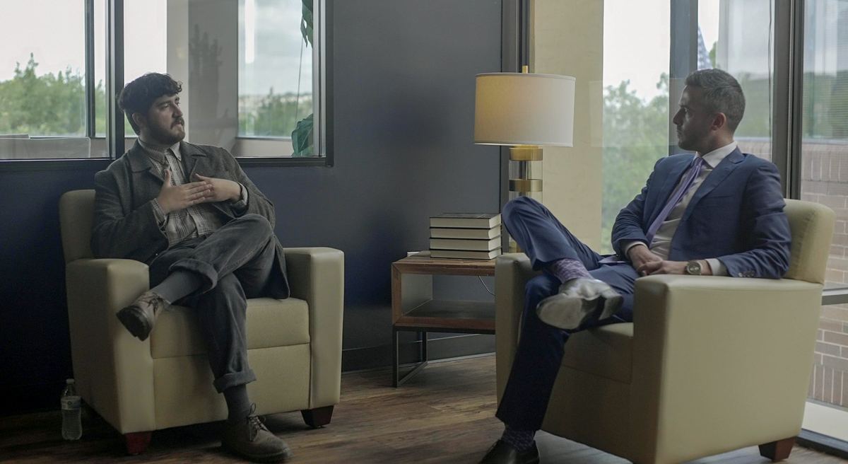 A client meeting with a Zinda Law Group attorney